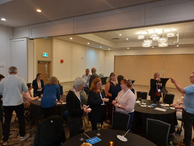 Members at Kootenay East Standing Ovation event