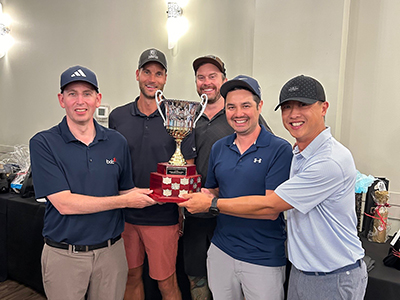 Stephen Hawkshaw joins  Brian Darrah, Eric Halpenny, Marcus Schalle, and Kern Chiu as they accept Team Low Scramble Trophy